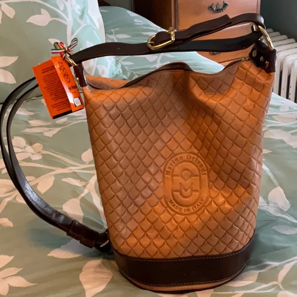 Marino Orlandi Handbags - NWT Marino Orlando shoulder/sling/crossbody leather bucket bag.